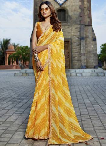 Attractive These Fancy Fastive Saree in Fine Colored.These Saree Are Georgette And Blouse is Fabricated On Art Silk Pair.Its Beautified With Disigner Bandhani,Laheriya Printed With Lace Border Work.