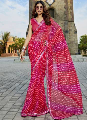 Attractive These Fancy Fastive Saree in Fine Colored.These Saree Are Georgette And Blouse is Fabricated On Art Silk Pair.Its Beautified With Disigner Bandhani,Laheriya Printed With Lace Border Work.