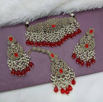 Attrective These Beautifil Colored Chiker Set Necklace.These Choker Set is Come Alloy Material And Beautified With Kundan Stone Work.