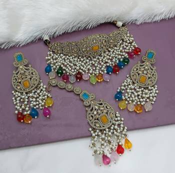 Attrective These Beautifil Colored Chiker Set Necklace.These Choker Set is Come Alloy Material And Beautified With Kundan Stone Work.
