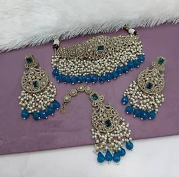 Attrective These Beautifil Colored Chiker Set Necklace.These Choker Set is Come Alloy Material And Beautified With Kundan Stone Work.