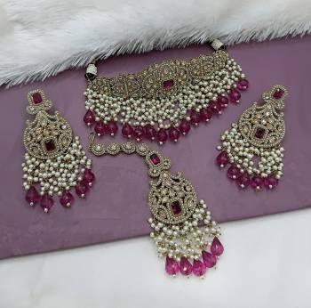 Attrective These Beautifil Colored Chiker Set Necklace.These Choker Set is Come Alloy Material And Beautified With Kundan Stone Work.