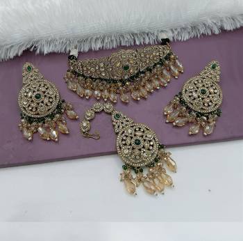 Attrective These Beautifil Colored Chiker Set Necklace.These Choker Set is Come Alloy Material And Beautified With Kundan Stone Work.