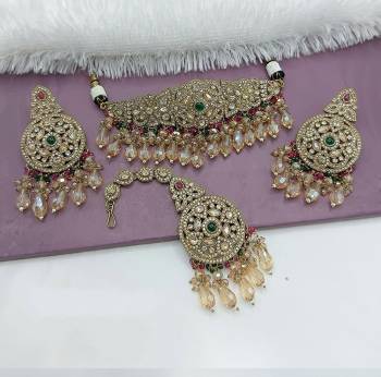 Attrective These Beautifil Colored Chiker Set Necklace.These Choker Set is Come Alloy Material And Beautified With Kundan Stone Work.