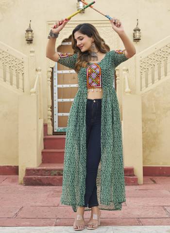 Looking These Beautiful Navratri Readymade Kurti.These Kurti is Fabricated On Faux Georgette.Its Beautified With Designer Bandhani Printed With Kutchi Patch Work.