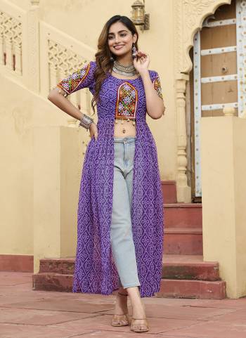 Looking These Beautiful Navratri Readymade Kurti.These Kurti is Fabricated On Faux Georgette.Its Beautified With Designer Bandhani Printed With Kutchi Patch Work.