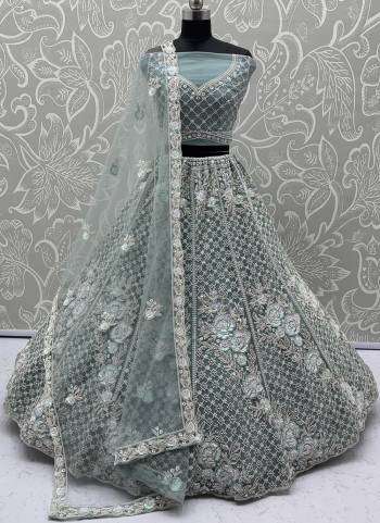 For A Fancy Designer Look,Grab These Lehenga Choli With Dupatta in Fine Colored.These Lehenga And Choli Are Net And Dupatta Are Fabricated On Soft Net Pair.Its Beautified With Fancy Designer Sequance,Dori Embroidery,Crystal Beads Hand Work. 