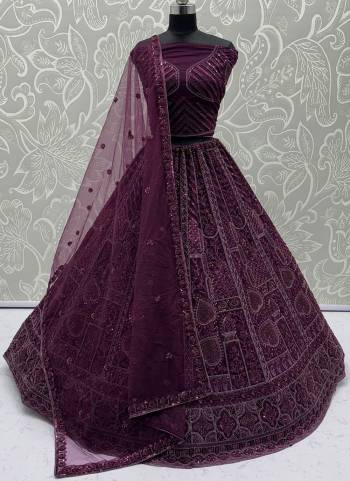 For A Fancy Designer Look,Grab These Lehenga Choli With Dupatta in Fine Colored.These Lehenga And Choli Are Net And Dupatta Are Fabricated On Soft Net Pair.Its Beautified With Fancy Designer Thread,Sequance,Dori Embroidery,Crystal Pipe Hand Work. 