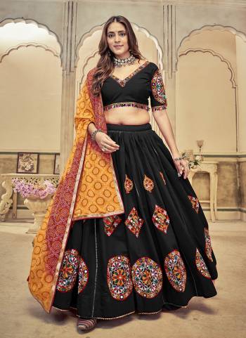 Looking These Navratri Wear Lehenga Choli in Fine Colored.These Lehenga Are Cotton Silk Choli Are Cotton Silk And Dupatta Are Fabricated On Chiffon Pair.Its Beautified With Designer Embroidery Petch Work With Printed Dupatta.