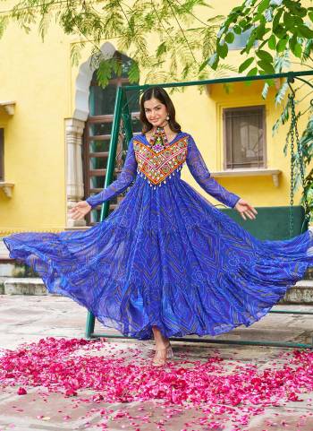 Garb These Beautiful Looking Readymade Navrati Long Gown.These Gown is Fabricated On Faux Georgette.Its Beautified With Bandhani Printed Designer, Kutchi Patch Work.