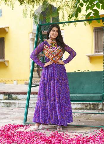 Garb These Beautiful Looking Readymade Navrati Long Gown.These Gown is Fabricated On Faux Georgette.Its Beautified With Bandhani Printed Designer, Kutchi Patch Work.
