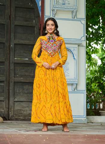 Garb These Beautiful Looking Readymade Navrati Long Gown.These Gown is Fabricated On Faux Georgette.Its Beautified With Bandhani Printed Designer, Kutchi Patch Work.