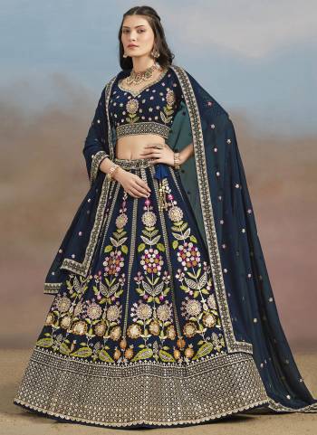 For A Designer Look,Grab These Lehenga Choli in Fine Colored.These Lehenga Are Georgette And Blouse Are Fabricated On Georgette Pair With Dupatta Are Georgette.Its Beautified With Designer Multy Thread,Dori,Jari,Sequance Embroidery Work.