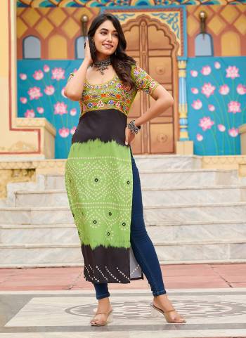 Looking These Beautiful Navratri  Readymade Kurti.These Kurti is Fabricated On Rayon.Its Beautified With Designer Printed With Kutchi Gamthi Embroidery Work.