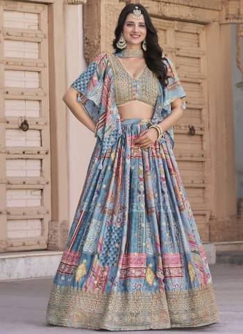 For A Designer Look,Grab These Lehenga Choli in Fine Colored.These Lehenga Are Chinon Silk And Blouse Are Fabricated On Chinon Silk Pair With Dupatta Are Chiffon.Its Beautified With Designer Digital Printed With Dori,Jari Embroidery Work.