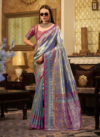 Looking These Party Wear Saree in Fine Colored.These Saree Are Tissue Silk And Blouse is Fabricated On Tissue Silk.Its Beautified With Heavy Woven Jari Designer.