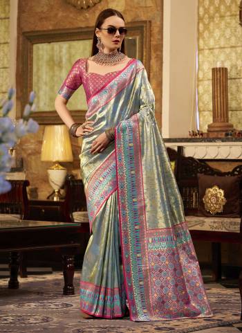 Looking These Party Wear Saree in Fine Colored.These Saree Are Tissue Silk And Blouse is Fabricated On Tissue Silk.Its Beautified With Heavy Woven Jari Designer.