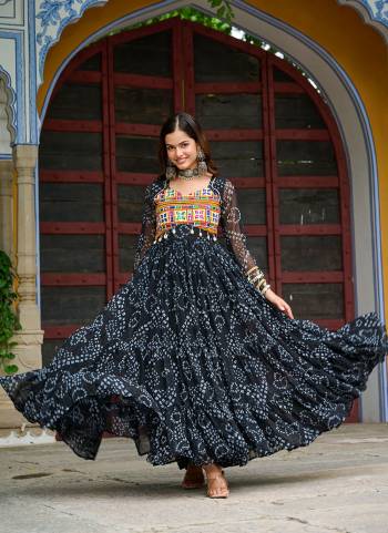 Garb These Beautiful Looking Readymade Navrati Long Gown.These Gown is Fabricated On Faux Georgette.Its Beautified With Bandhani Printed Designer, Kutchi Patch Work.