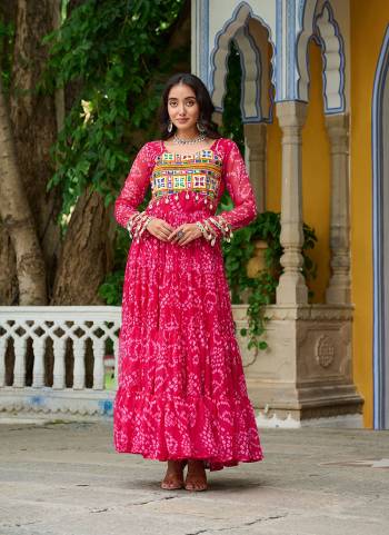 Garb These Beautiful Looking Readymade Navrati Long Gown.These Gown is Fabricated On Faux Georgette.Its Beautified With Bandhani Printed Designer, Kutchi Patch Work.