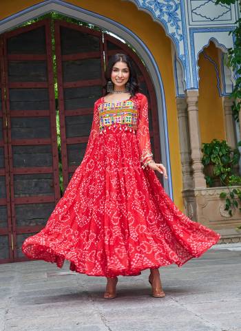 Garb These Beautiful Looking Readymade Navrati Long Gown.These Gown is Fabricated On Faux Georgette.Its Beautified With Bandhani Printed Designer, Kutchi Patch Work.