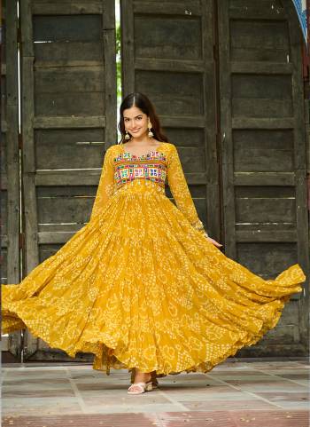 Garb These Beautiful Looking Readymade Navrati Long Gown.These Gown is Fabricated On Faux Georgette.Its Beautified With Bandhani Printed Designer, Kutchi Patch Work.