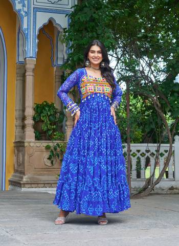 Garb These Beautiful Looking Readymade Navrati Long Gown.These Gown is Fabricated On Faux Georgette.Its Beautified With Bandhani Printed Designer, Kutchi Patch Work.