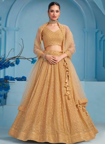 For A Designer Look,Grab These Party Wear Lehenga Choli in Fine Colored.These Lehenga And Blouse Are Fabricated On Georgette Pair With Dupatta Are Soft Net.Its Beautified With Thread,Sequance Embroidery Work.