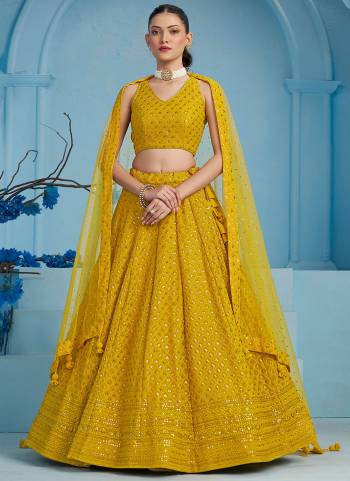 For A Designer Look,Grab These Party Wear Lehenga Choli in Fine Colored.These Lehenga And Blouse Are Fabricated On Georgette Pair With Dupatta Are Soft Net.Its Beautified With Thread,Sequance Embroidery Work.