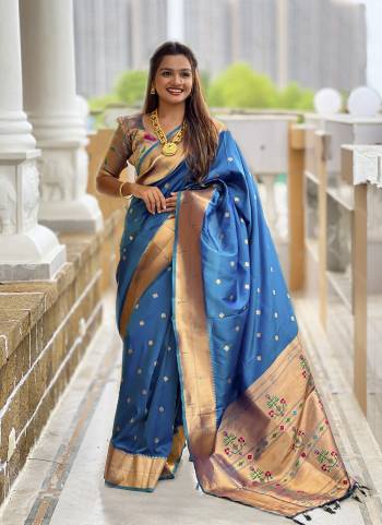 Attrective These Party Wear Saree in Fine Colored.These Saree And Blouse is Fabricated On Paithani Silk.Its Beautified With Weaving Jacquard Jari Designer.