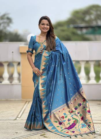 Looking These Party Wear Saree in Fine Colored.These Saree And Blouse is Fabricated On Paithani Silk.Its Beautified With Weaving Meenakari Pallu Jacquard Designer.