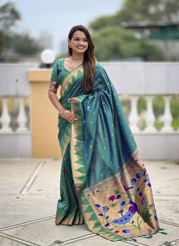 Looking These Party Wear Saree in Fine Colored.These Saree And Blouse is Fabricated On Paithani Silk.Its Beautified With Weaving Meenakari Pallu Jacquard Designer.