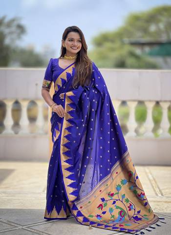 Looking These Party Wear Saree in Fine Colored.These Saree And Blouse is Fabricated On Paithani Silk.Its Beautified With Weaving Meenakari Pallu Jacquard Designer.