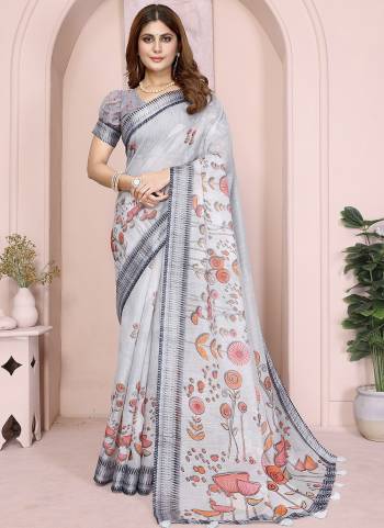 Looking These Party Wear Saree in Fine Colored.These Saree And Blouse is Fabricated On Linen Cotton.Its Beautified With Woven Silver Border Designer With Digital Printed.