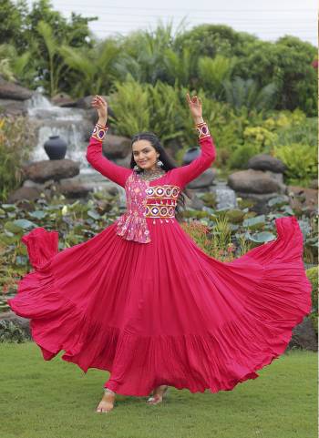 Garb These Beautiful Navratri Wear Readymade Long Gown.These Gown is Fabricated On Rayon.Its Beautified With Designer Kutchi Gamthi Embroidery Work.