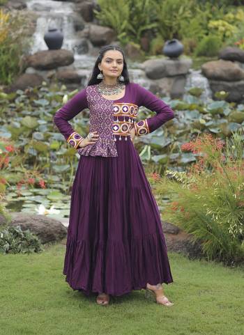 Garb These Beautiful Navratri Wear Readymade Long Gown.These Gown is Fabricated On Rayon.Its Beautified With Designer Kutchi Gamthi Embroidery Work.