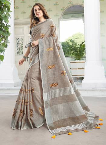 Garb These Fastive And Party Wear Saree in Fine Colored.These Saree And Blouse is Fabricated On Linen.Its Beautified With Heavy Woven Pallu Border Designer With Thread Embroidery Work.