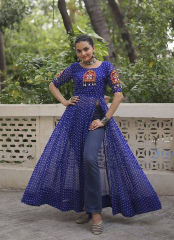 Looking These Beautiful Navratri  Readymade Kurti.These Kurti is Fabricated On Faux Georgette.Its Beautified With Designer Bandhani Printed With Kutchi Gamthi Patch Work.