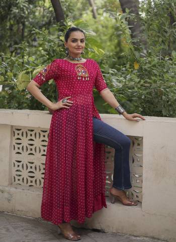 Looking These Beautiful Navratri  Readymade Kurti.These Kurti is Fabricated On Faux Georgette.Its Beautified With Designer Bandhani Printed With Kutchi Gamthi Patch Work.