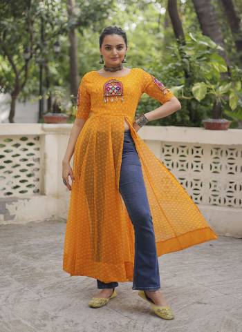 Looking These Beautiful Navratri  Readymade Kurti.These Kurti is Fabricated On Faux Georgette.Its Beautified With Designer Bandhani Printed With Kutchi Gamthi Patch Work.