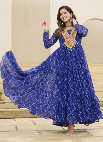 Garb These Beautiful Looking Readymade Navrati Long Gown.These Gown is Fabricated On Faux Georgette.Its Beautified With Bandhani Printed Designer, Kutchi Patch Work.