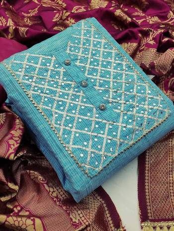 This Designer Suit In Lovely Color.?Its Pretty Top Is Cotton With Gota Work Based Paired With Santoon Bottom And Banarasi Jacquard Fabricated Dupatta Which Gives An Attractive To The Suit.