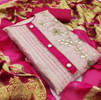 This Designer Suit In Lovely Color.?Its Pretty Top Is Modal Chanderi With Gota Patti Work Based Paired With Santoon Bottom And Banarasi Jacquard Fabricated Dupatta Which Gives An Attractive To The Suit.