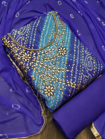 This Designer Suit In Lovely Color.?Its Pretty Top Is Fancy Jacquard With Hand Work Based Paired With Santoon Bottom And Nazneen Bandhni Printed Fabricated Dupatta Which Gives An Attractive To The Suit.