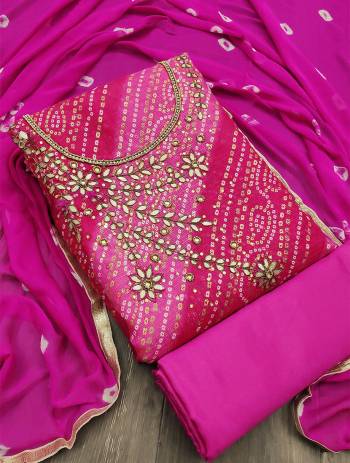 This Designer Suit In Lovely Color.?Its Pretty Top Is Fancy Jacquard With Hand Work Based Paired With Santoon Bottom And Nazneen Bandhni Printed Fabricated Dupatta Which Gives An Attractive To The Suit.
