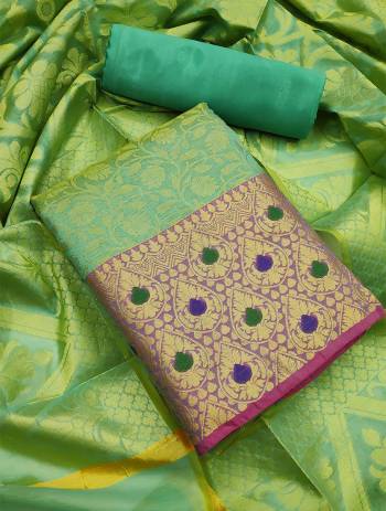 Celebrate This Festive Season In A Proper Traditional Look Wearing This Weaved Straight Suit In Fine Color. This Pretty Suit Is Banarasi Jacquard Based Beautified With Weave. Its Fabric Gives A Rich Look To Your Personality