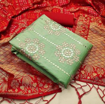 Celebrate This Festive Season In A Proper Look Wearing This Weaved Straight Suit In Fine Color. This Pretty Suit Is Fancy Cotton With Gota Patti Work Based Beautified With Weave And Banarasi Jacquard Dupatta. Its Fabric Gives A Rich Look To Your Personality