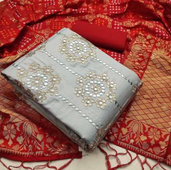 Celebrate This Festive Season In A Proper Look Wearing This Weaved Straight Suit In Fine Color. This Pretty Suit Is Fancy Cotton With Gota Patti Work Based Beautified With Weave And Banarasi Jacquard Dupatta. Its Fabric Gives A Rich Look To Your Personality