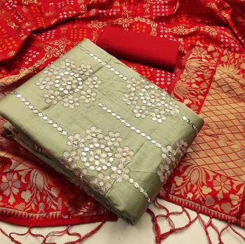 Celebrate This Festive Season In A Proper Look Wearing This Weaved Straight Suit In Fine Color. This Pretty Suit Is Fancy Cotton With Gota Patti Work Based Beautified With Weave And Banarasi Jacquard Dupatta. Its Fabric Gives A Rich Look To Your Personality