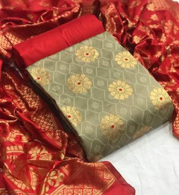 Look This Weaved Straight Suit In Fine Color. This Pretty Suit Is Banarasi Jacquard Based Top And Dupatta Beautified With Weave Designer And Bottom Are Tapeta Silk. Its Fabric Gives A Rich Look To Your Personalit.