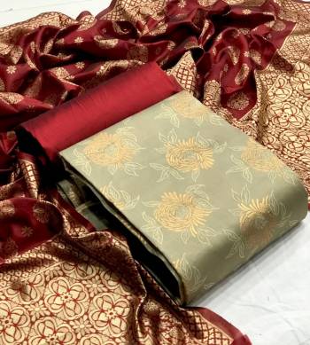 Look This Weaved Straight Suit In Fine Color. This Pretty Suit Is Banarasi Jacquard Based Top And Dupatta Beautified With Weave Designer And Bottom Are Tapeta Silk. Its Fabric Gives A Rich Look To Your Personalit.
